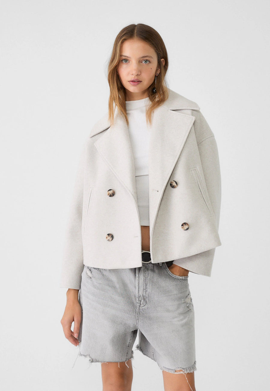 Chaqueta corta con doble abotonadura - Elegante y funcional
