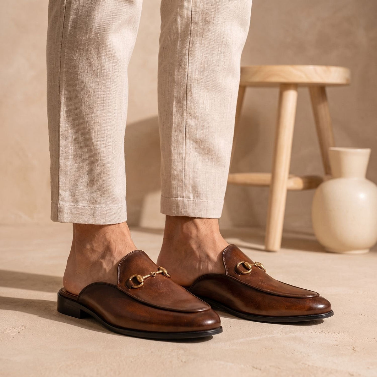 Mocasines mule destalonados de piel premium con bocado para hombre