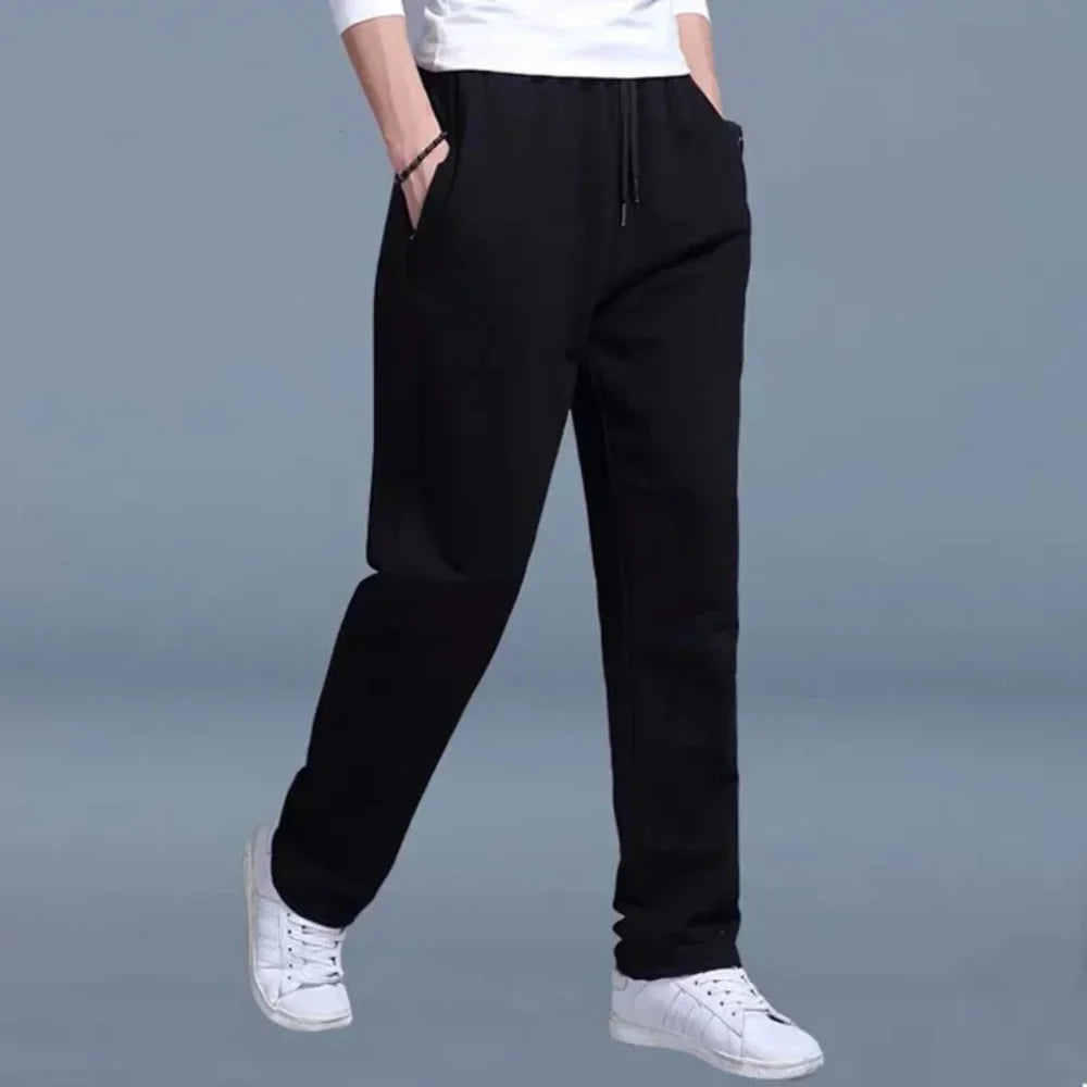 Pantalón de chándal para hombre de corte holgado en tejido mixto transpirable con cintura elástica y bolsillos laterales