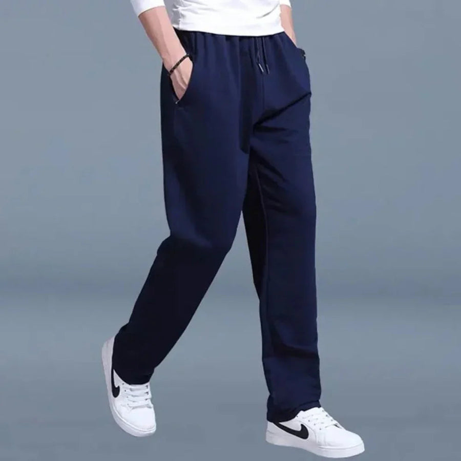 Pantalón de chándal para hombre de corte holgado en tejido mixto transpirable con cintura elástica y bolsillos laterales